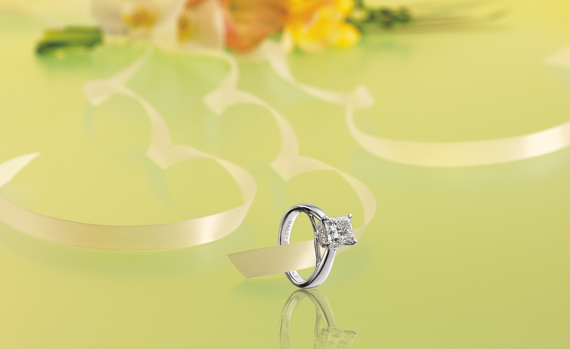 Princess cut, radiant diamond solitaire engagement ring.
